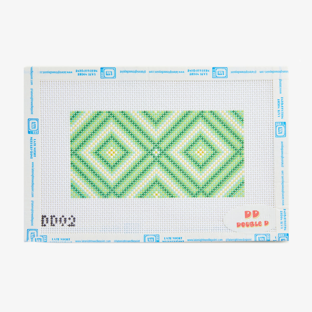 Cross-stitch pattern with green and white geometric design on a white background