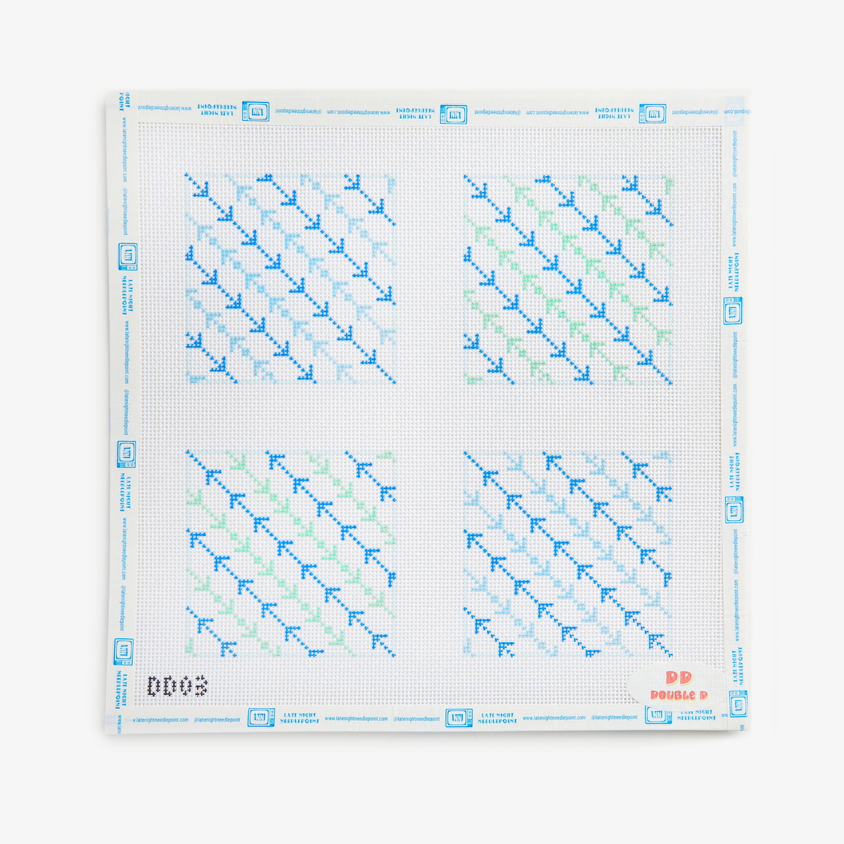 Cross-stitch pattern with blue and green threads on a white background