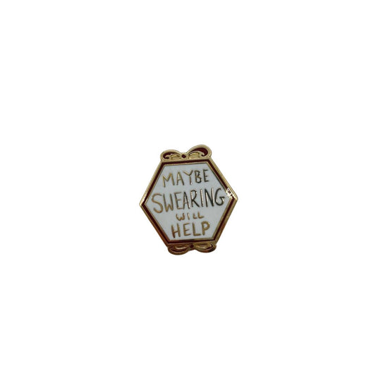 A needle minder with a humorous sign that reads 'Maybe Swearing Will Help'.