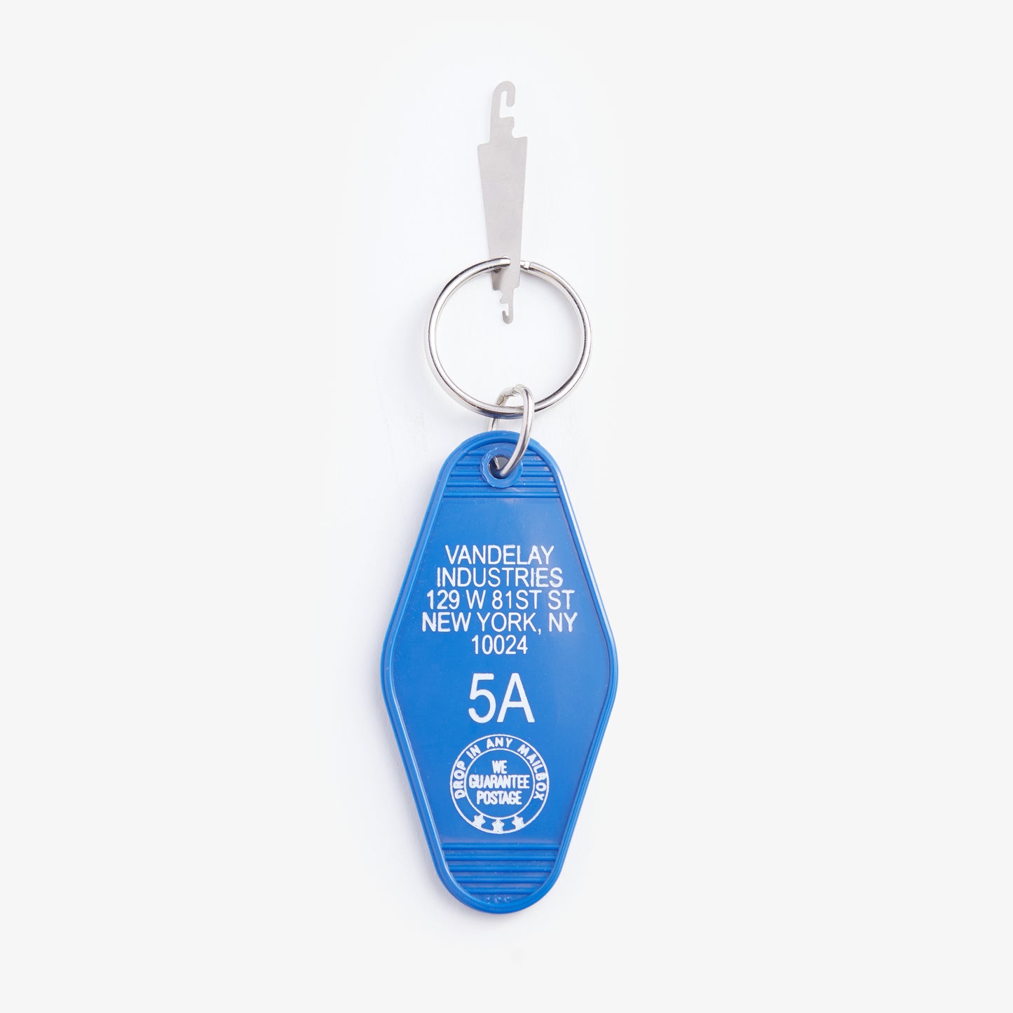 Blue keychain with text on a white background