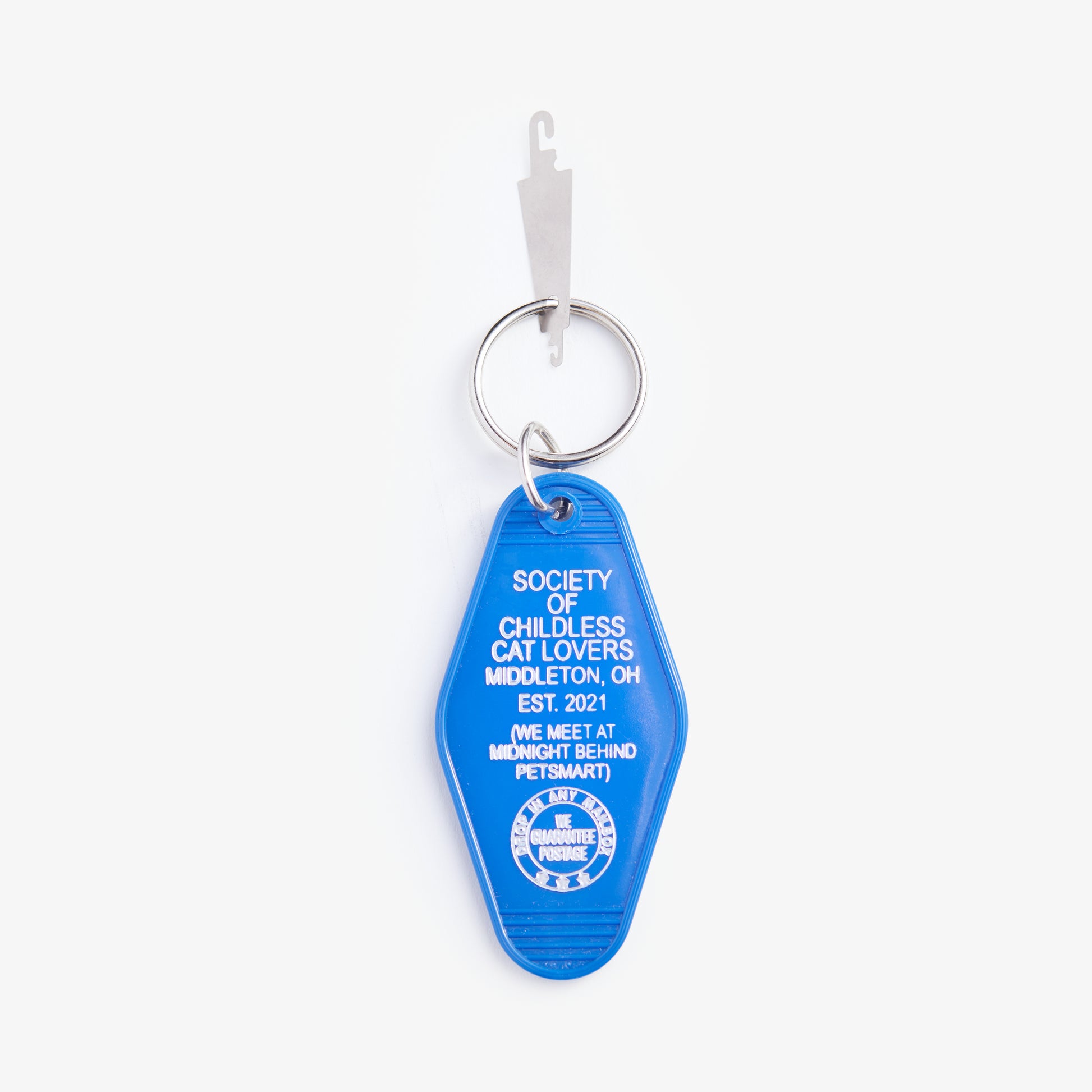 Blue keychain with text on a white background