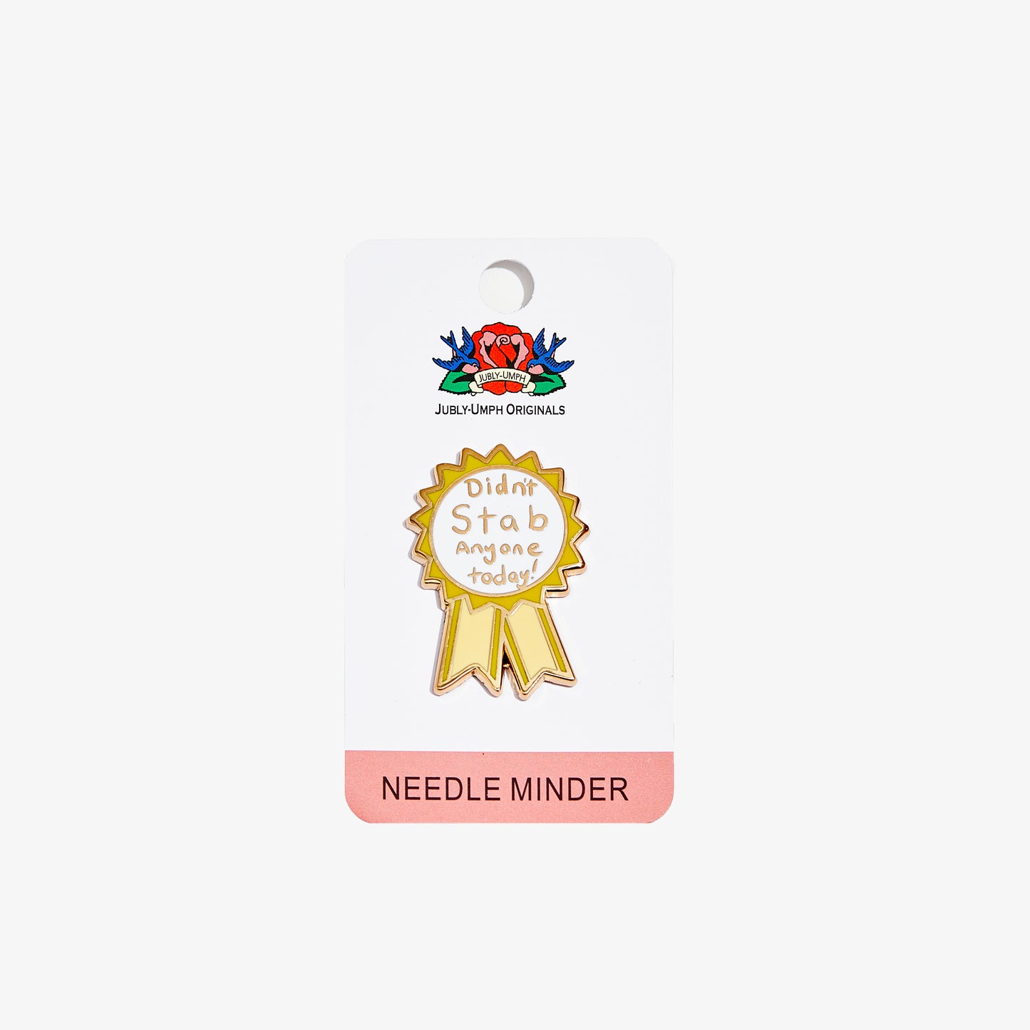 Gold needle minder with 'Didn't stab anyone today' text on a white background