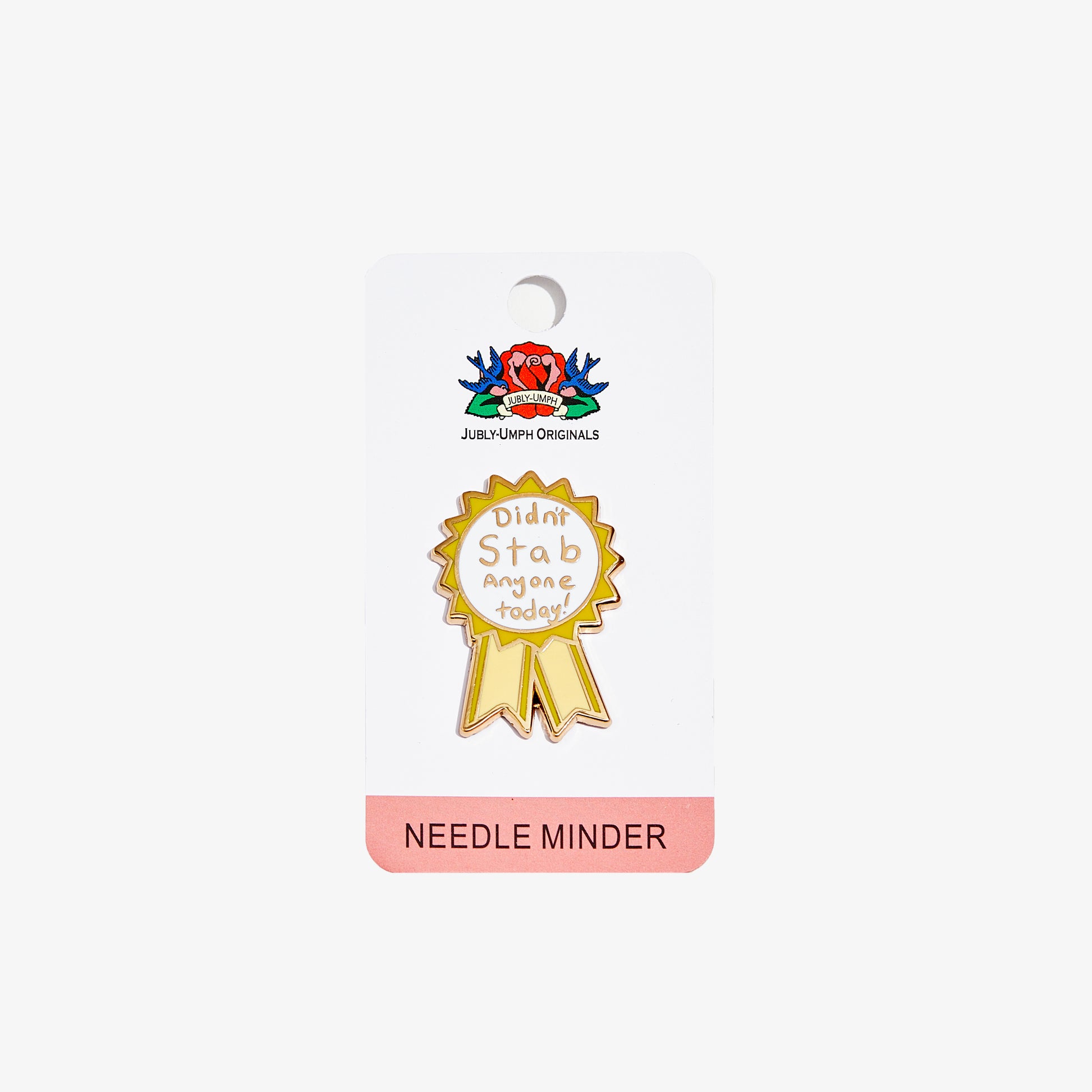 Gold needle minder with 'Didn't stab anyone today' text on a white background