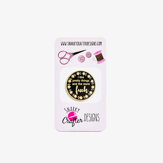 Pin with floral design and text on a Snarky Crafter Designs card