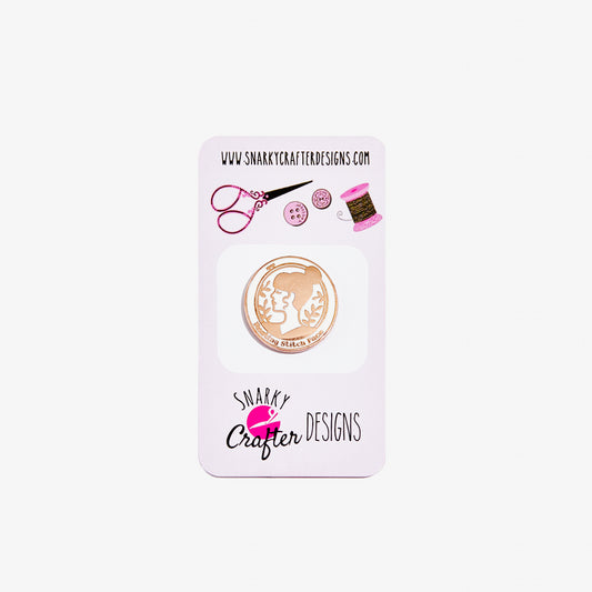 Snarky Crafter Designs badge on a white background