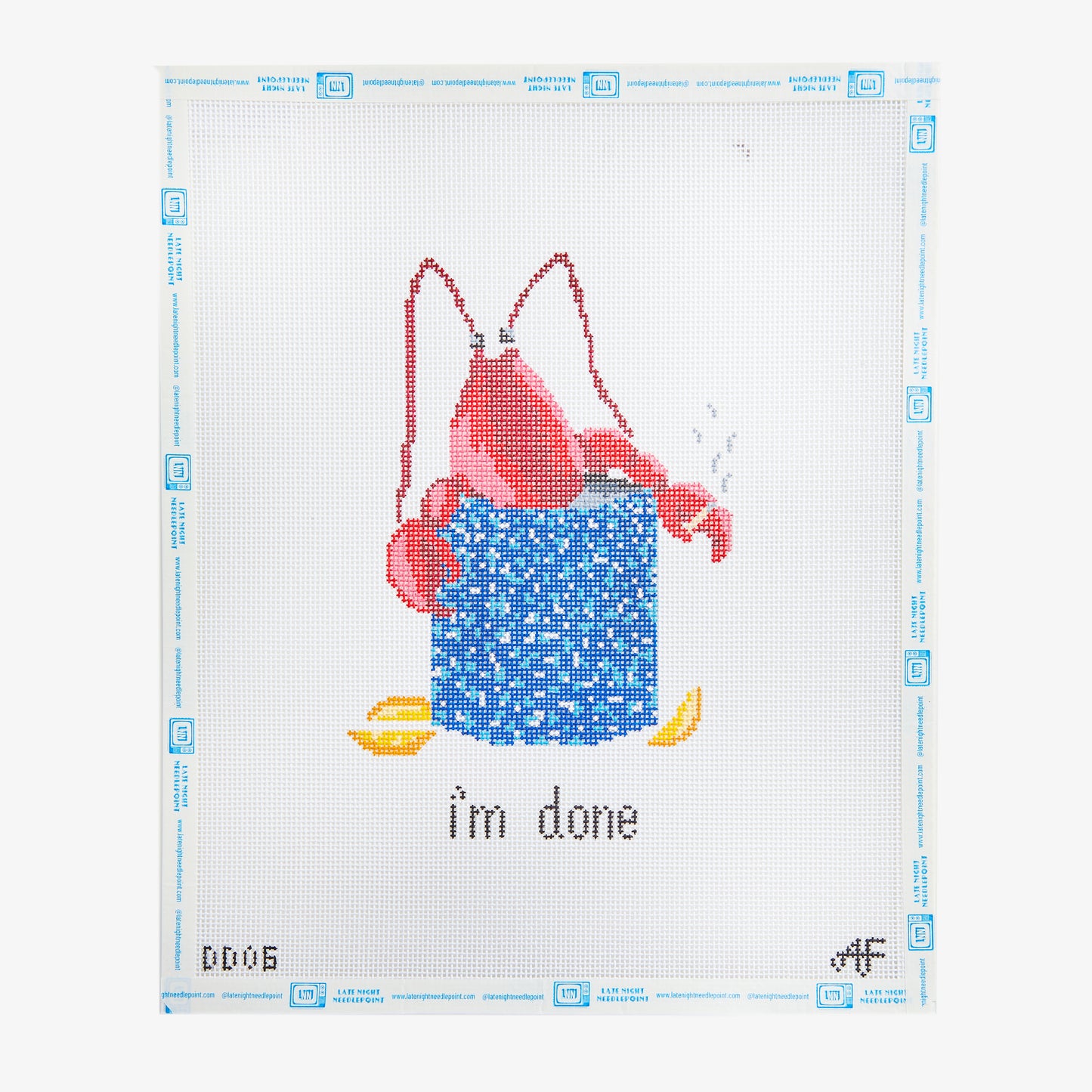 Cross-stitched design of a lobster with a blue box labeled 'i'm done' on a white background.
