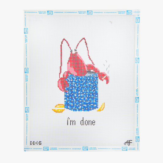 Cross-stitched design of a lobster with a blue box labeled 'i'm done' on a white background.