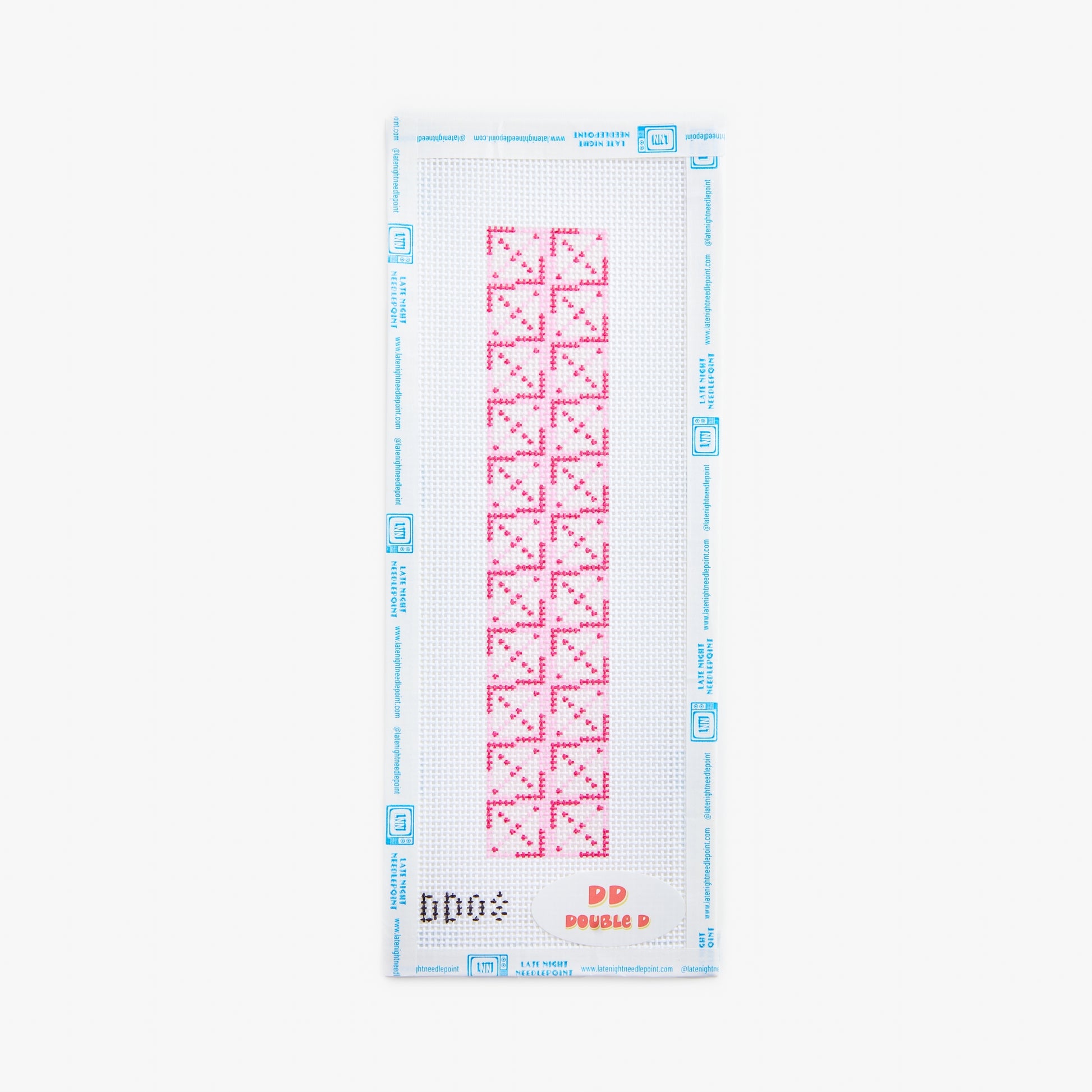 Cross-stitching pattern with red designs on a white background