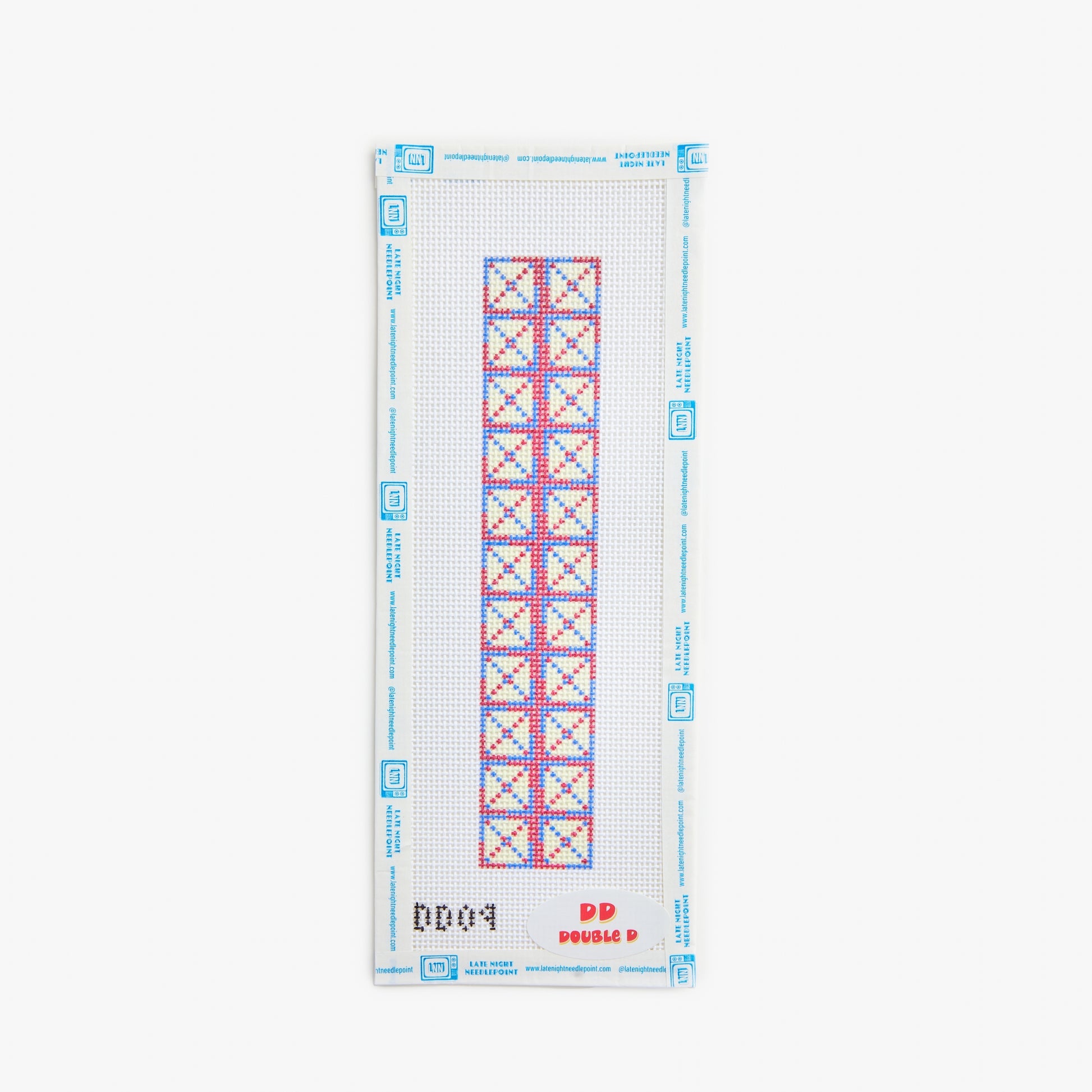 Cross stitch pattern on a white fabric with blue border and red and blue geometric design.