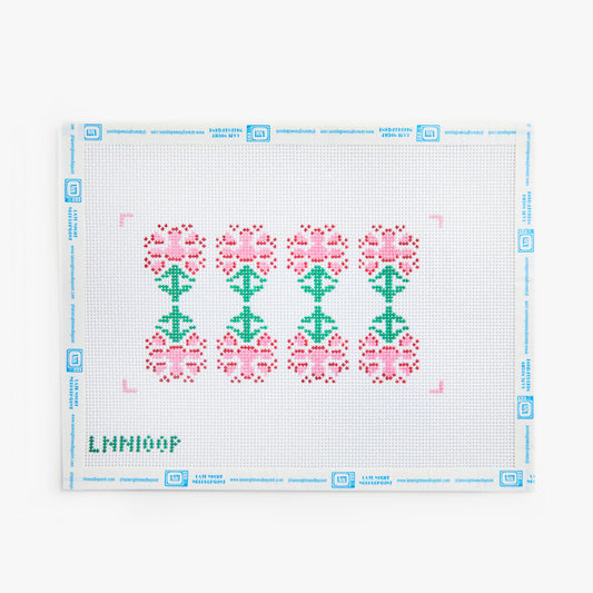 Cross-stitch pattern with pink and green flowers on a white background